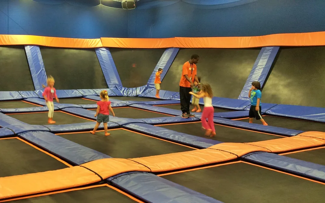 Children joyfully bouncing on colorful trampolines at Gazivuu trampoline park